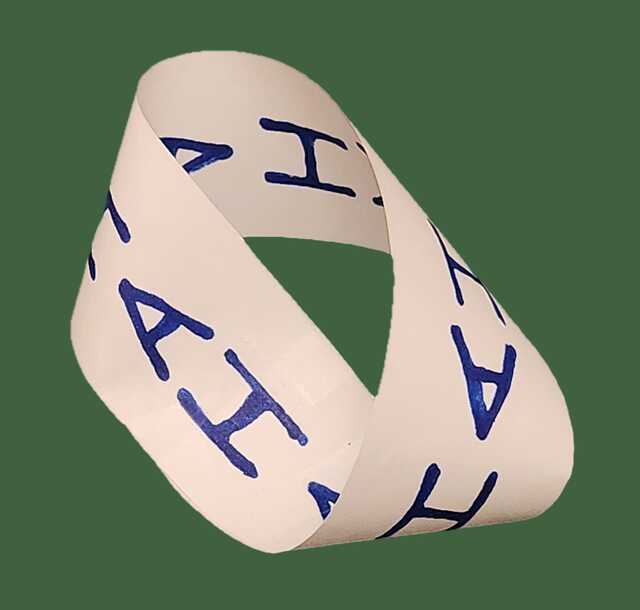 A Möbius strip with "HAHAHA..." written vertically
